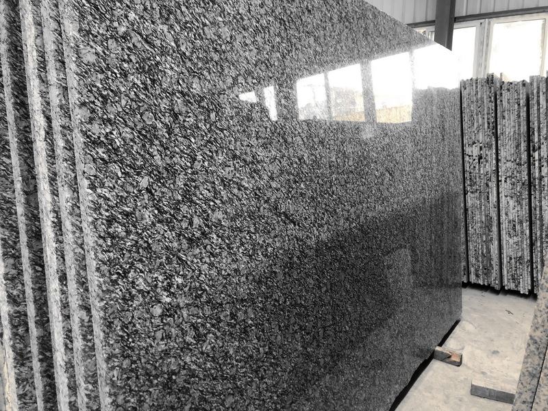 Grade A Spray White-Wave white Granite.jpg