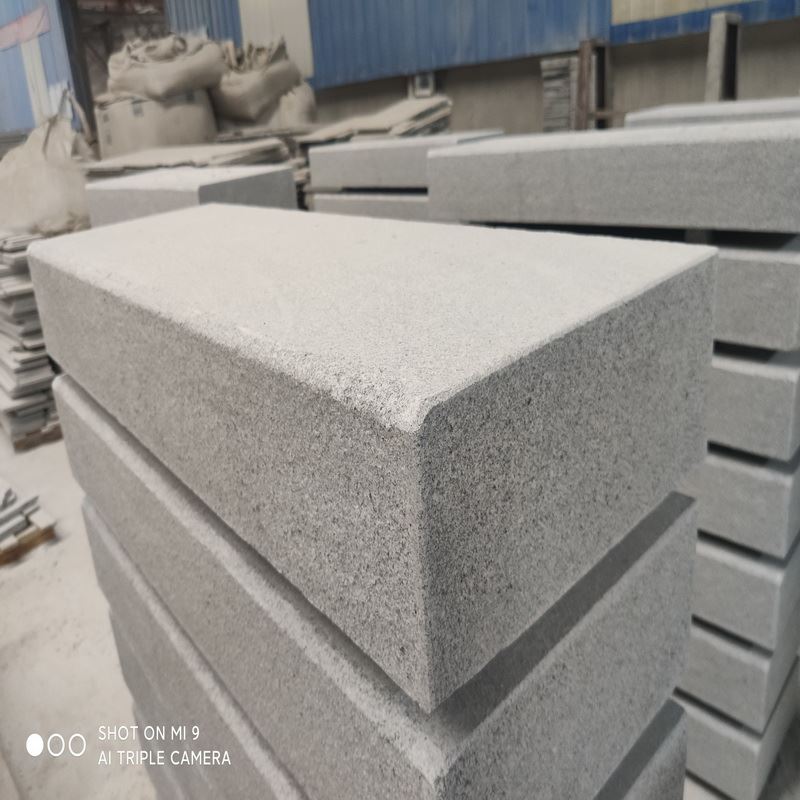 grey kerbstone